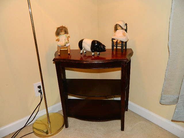 Vintage Table With Collectibles Upon The Piece and Nice Floor Lamp Beside It