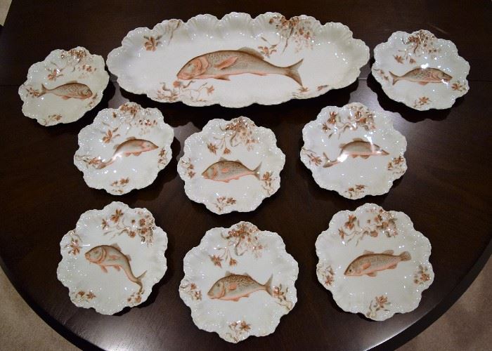 Vintage "Fish" dishes including a large platter and 8 plates.  Beautiful scalloped edges, no known chips.  The next picture shows the hallmarks on the back of each item
