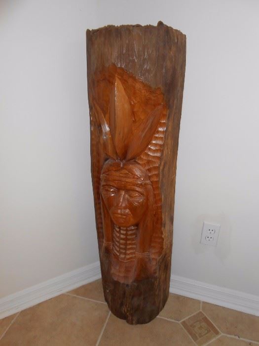 native american carved log