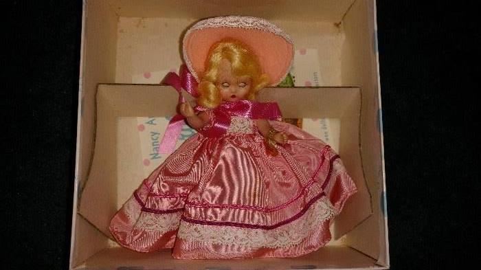 Just one of the many vintage dolls and toys at this sale