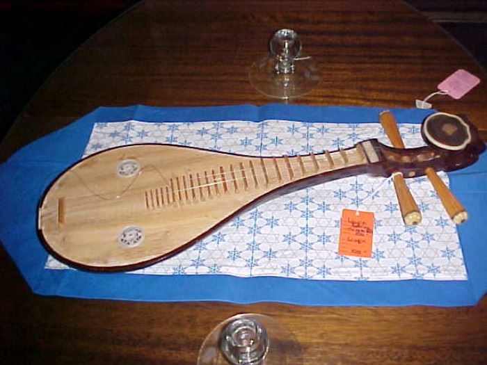 This is a Liuqin- a three stringed Chinese lute