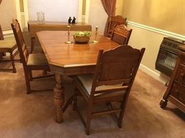 Jacobean style/ Jacobean revival  Reaser Furniture Company       Ghettysburg, Penna      Dining Room Table, Sideboard, and 6 chairs.  One chair is an armchair.