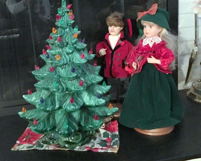 Large Ceramic Christmas tree and tall Christmas dolls.