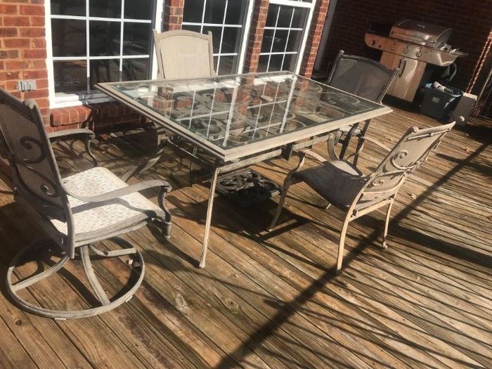 #93	Metal/Glass top table w/4 chairs  72x40x29	 $200.00 	