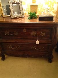 One of two identical two-drawer night stands