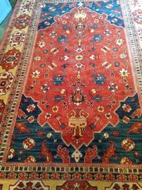 Handsome 5 feet 6 inches by 9 feet rug