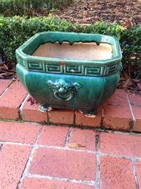 One of two green planters