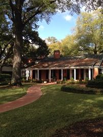 This immaculately landscaped 7000 square foot home is for sale and offered by Jim McCain.