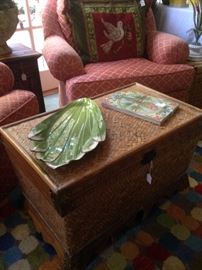 Wicker trunk makes a great coffee table.