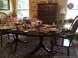 Henkel Harris dining table, antique Windsor chairs, Century highboy