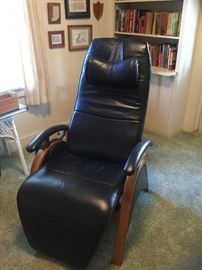 Relax the Back black leather chair. Original retail price...$2000. 