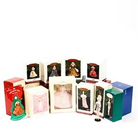 Hallmark Collectible Ornaments Featuring Barbie Doll Designs: A collection of seventeen Hallmark holiday ornaments featuring Barbie doll themes. The majority of the ornaments date to the 1990s, with some dated in the 2000’s. They all come in the original boxes, with the names of the ornament and images of them on the boxes.