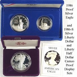 Coins 1986 Siver Eagle Slver LibertyDollar and Half Dollar Display Sets