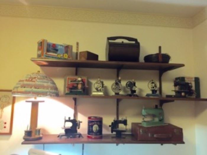Rare miniature sewing machine collection and accessories as well as a stained glass lamp