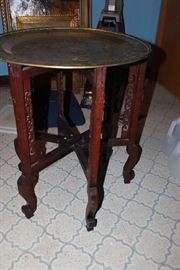 Oriental folding table with brass top 