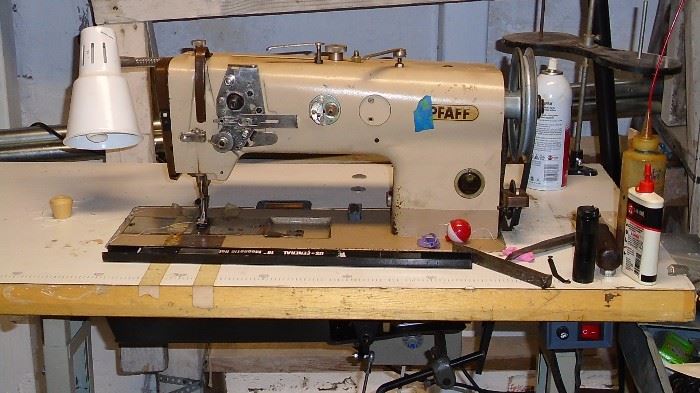 Heavy duty industrial Pfaff sewing machine in great working condition. Servo motor, compound walking foot, reverse. VERY heavy.