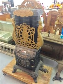 This is an "Estate Original Triple Effect",gas parlor stove,can be converted to propane by changing valves. It was made by The Estate Stove Co. Hamilton,Ohio. F&L Kahn Bros. Hamilton,Ohio   This stove has these markings written all over it.  Very ornate and all in very good condition.         Research These .