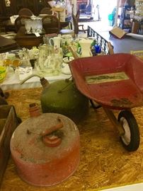 old Metal gas cans and Childs Wheel Barrow