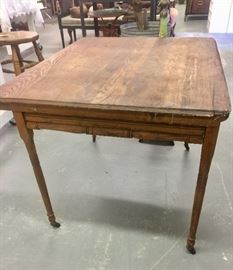 Antique Chestnut Folding Table with old wheels 