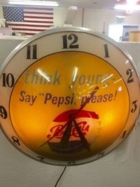 Vintage Lighted think young Say Pepsi Please Bubble Glass Clock  Made in Cincinnati Ohio in Working Condition 

Description: with "Think Young - Say Pepsi Please" slogan under convex glass fitted in aluminum frame. Back marked for "Advertising Products, Inc. / Cincinnati, Ohio". Mid 20th century modern 

Condition: Excellent condition Currently working.