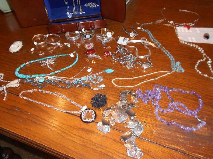 Gold, silver, turquoise, and other precious stones 