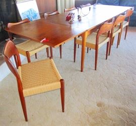 Mid Century Teak extending table--with 8 teak chairs.
