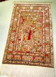 Hereke  Silk & Gold Thread Oriental Carpet with Tree of Life Design .  Mid Century--1950 s production: Silk & Metallic 10 kt Gold Thread with high 1000+ kpi count.  Dimensions: 3. 5 ft x 5.6 ft . Gold metallic thread and silk Hereke rugs of this size are extremely rare and we challenge anyone to show us another one for sale inside the country at this time. These rugs are usually only made per order for royalty, heads of state or other VIP s and seldom find their way into the general market.  Condition: Perfect .  This is  very rare opportunity to own one of these heirloom pieces...otherwise one has a better chance of being struck by lightning than to ever see another one again!