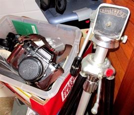 Nikon reflex camera in excellent condition with all the extra lenses, a flash and tripod