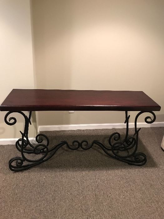 Beautiful wooden top sofa table
Wrought iron legs and base 
Brand new condition 
Dimensions: 
Width: 60 inches 
Depth: 17 inches
Height: 28inches
