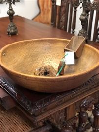Antique wooden bowl with wooden scoop