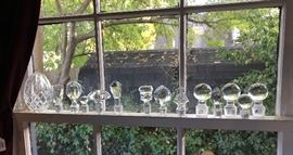 A collection of crystal bottle stoppers