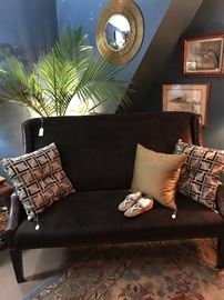 A leather and suede loveseat