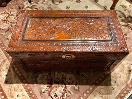 And incredibly hand carved Chinese chest