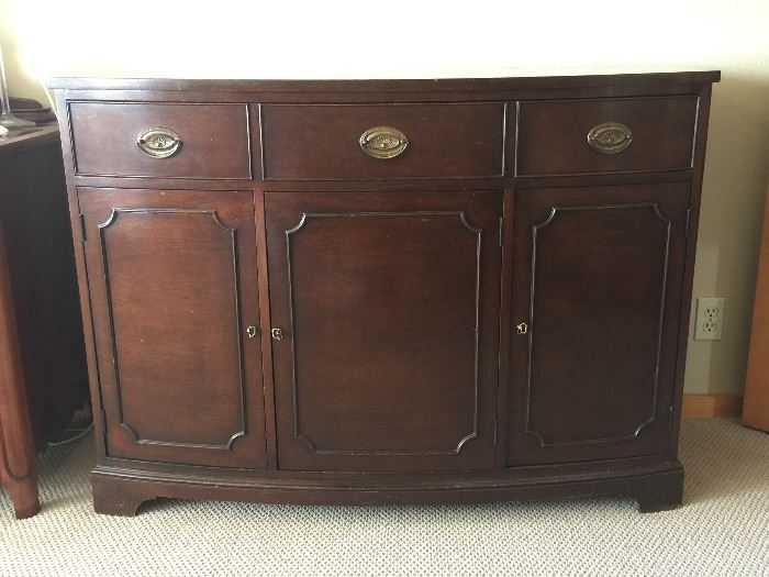 Curved buffett - one large drawer w/three cabinet doors