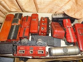 Boxes and boxes of model trains, transformers, tracks and accessories.