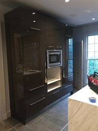 Pair of custom 30" integrated Sub Zero Refrigerator/freezers. Custom made cabinetry by Downsview kitchens.