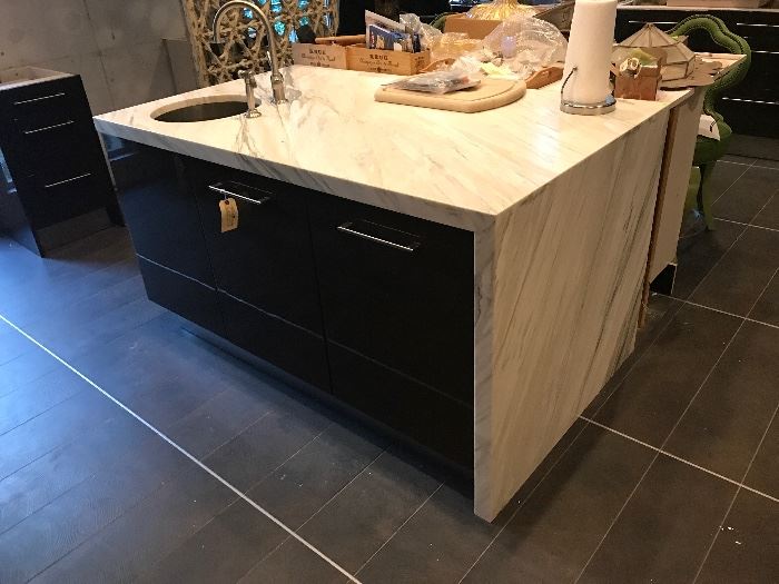 Custom island by Downsview Kitchens and marble surround.