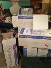 Nine full boxes of Armstrong Ceiling tiles - each box has 40 one square foot tiles