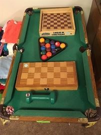 mini-pool table, checkers and chess sets