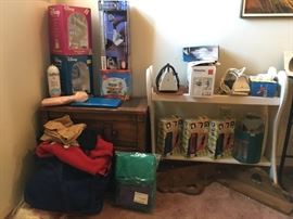 night stand, LCR games-new in box, Disney items-also new in box, irons, quilt rack