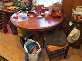 round oak dining table, ladderback dining chair with wood slat bottom, Gatorade sports bottles