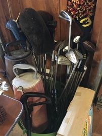assorted golf clubs