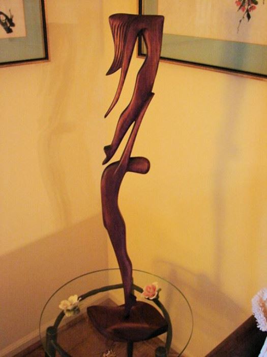One of several carved Brazilian mahogany figurines