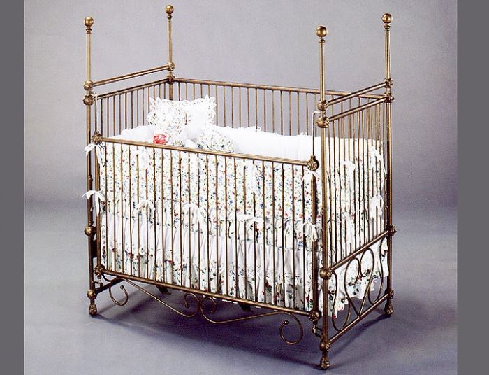 Crib by Benicia foundry and Iron Works . There is a changing table that goes with it.