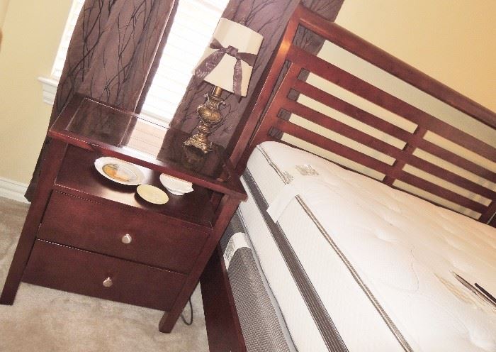 Bedroom Sleigh bed with thick, newer queen mattress.  Display style dresser, chest and side table