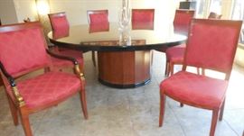 Dining Room:  You can now see the base of the table as well as one [of two] of the dolphin arm chairs and one [of six] of the side chairs. 