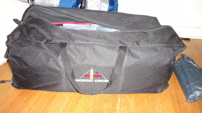 Nordic Cross duffle bag with all tent parts.  Literature says 8 people tent.  