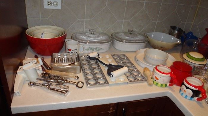 Ravioli forms and roller,  bowls, covered casseroles, new new tomato slicer, new portable garlic or vegetable chopper, pastry tips, cheese grater, egg slicer, wine bottle opener......all like new if not new. 