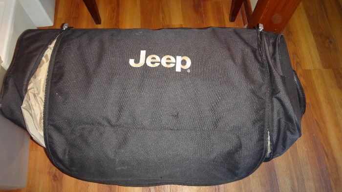 Jeep duffle bag for tent .....it is packed full.   Zipper difficult to work. Bag is very, very  heavy.    