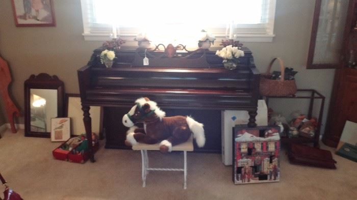 Ethan Allen mirror,  Pottery Barn frame, umbrella stand, potpourri, advent calendar with  opening doors to compartments, antique basket, Miss Piggy & Kermit dolls in carrying case with many outfits for each, wrought iron piano bench, piano, briefcase (leather).    
